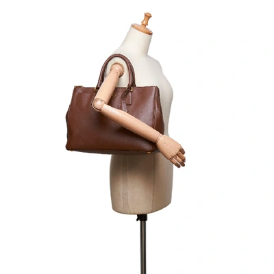 Shop Prada Saffiano Leather Galleria Handbag In Brown