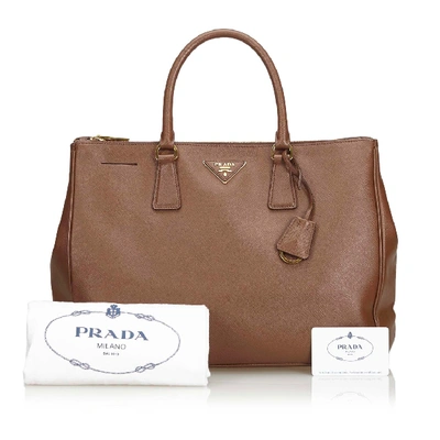 Shop Prada Saffiano Leather Galleria Handbag In Brown