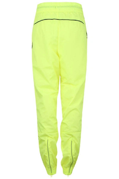 Shop Puma Chase Woven Pant In Yellow