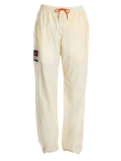 Shop Heron Preston Parachute Track Trousers In Off White