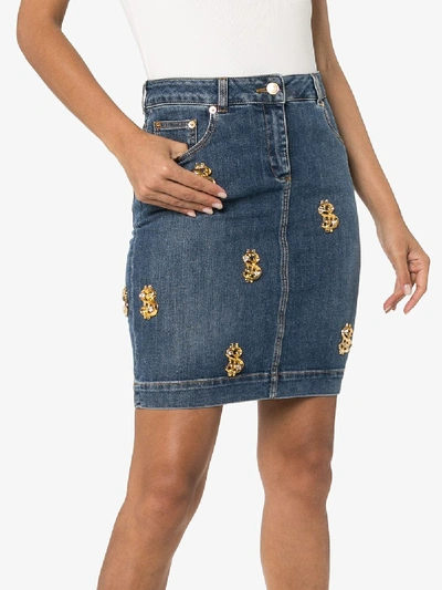 Shop Moschino Dollar Appliqué Denim Skirt In Blue