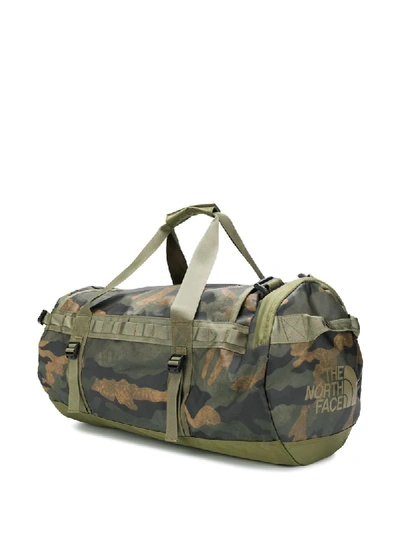 Shop The North Face Camouflage-print Duffle Bag In Green
