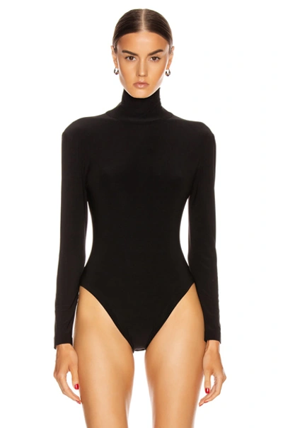 Shop Norma Kamali Long Sleeve Turtleneck Bodysuit In Black