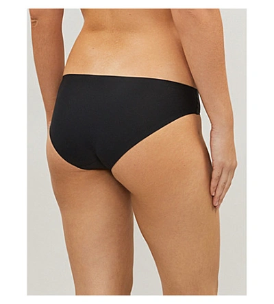 Shop Calvin Klein Invisibles Jersey Bikini Briefs In 001 Black