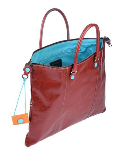 Shop Gabs Handbag In Maroon