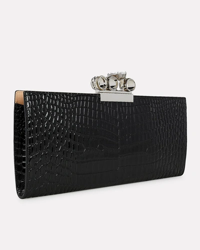 Shop Alexander Mcqueen Four Ring Croc-embossed Clutch In Black