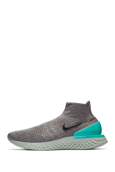 Shop Nike Rise React Flyknit Sock Sneaker In 002 Gunsmk/black