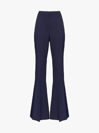 Shop Alexander Mcqueen Satin Trim Flared Trousers In Blue