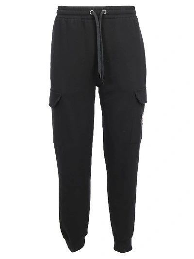 Shop Burberry Pocketed Drawstring Track Pants In Black