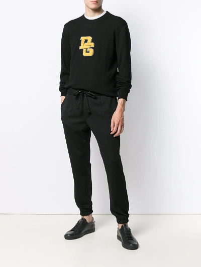 Shop Dolce & Gabbana Written Trousers In Black