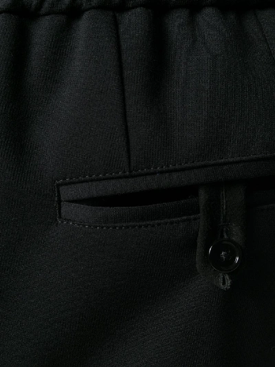 Shop Dolce & Gabbana Written Trousers In Black
