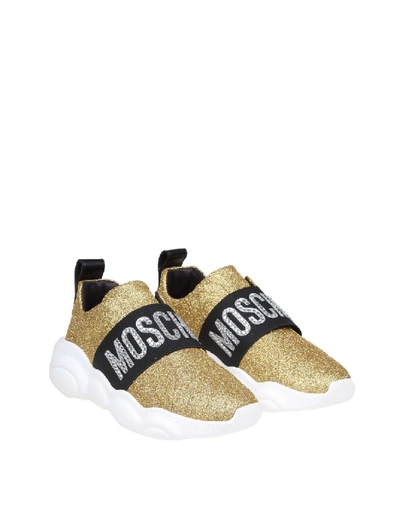 Shop Moschino Teddy Sneakers In Glitter Gold Color In White