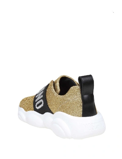 Shop Moschino Teddy Sneakers In Glitter Gold Color In White