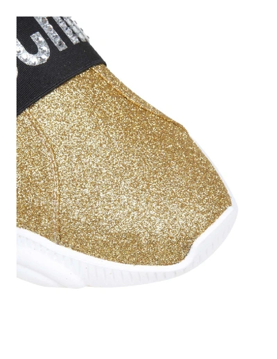 Shop Moschino Teddy Sneakers In Glitter Gold Color In White