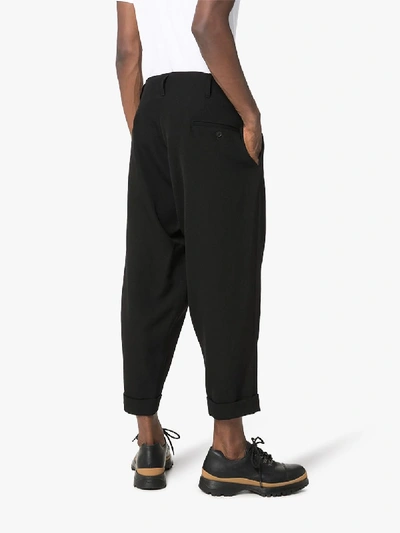 Shop Yohji Yamamoto Drop Crotch Cropped Trousers In Black