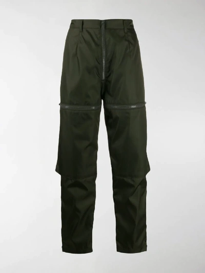 Shop Prada Technical Zipped Trousers In Green