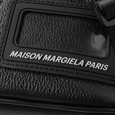 Shop Maison Margiela 11 Cut Out Messenger Bag In Black