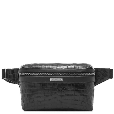 Shop Saint Laurent Embossed Croc Waist Bag In Black