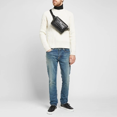 Shop Saint Laurent Embossed Croc Waist Bag In Black