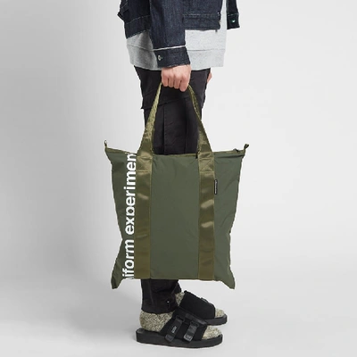 Shop Uniform Experiment Packable Tote In Green