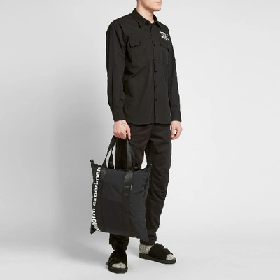 Shop Uniform Experiment Packable Tote In Black