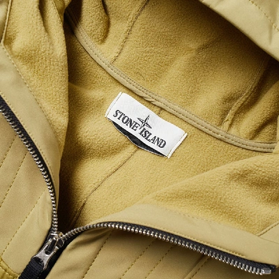 Shop Stone Island Soft Shell-r Hooded Jacket In Yellow