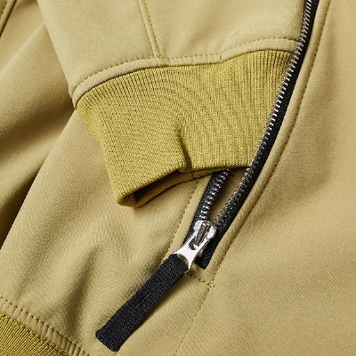 Shop Stone Island Soft Shell-r Hooded Jacket In Yellow