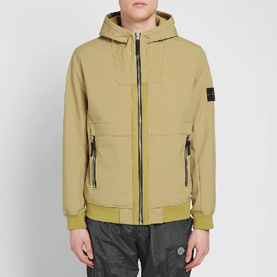 Shop Stone Island Soft Shell-r Hooded Jacket In Yellow