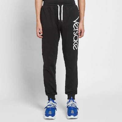 Shop Versace 80s Logo Embroidered Sweat Pant In Black