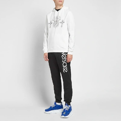 Shop Versace 80s Logo Embroidered Sweat Pant In Black