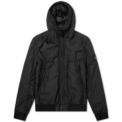 Shop Stone Island Garment Dyed Crinkle Reps Ny Piping Hooded Jacket In Black