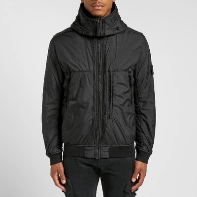 Shop Stone Island Garment Dyed Crinkle Reps Ny Piping Hooded Jacket In Black