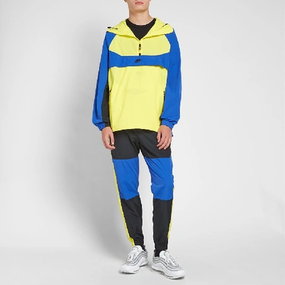 Shop Nike Re-issue Woven Popover Jacket In Yellow