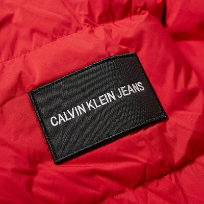 Shop Calvin Klein Institutional Logo Puffer Jacket In Red