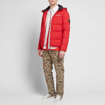 Shop Calvin Klein Institutional Logo Puffer Jacket In Red