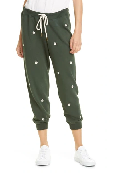 Shop The Great The Cropped Sweatpants With Floral Embroidery In Clover