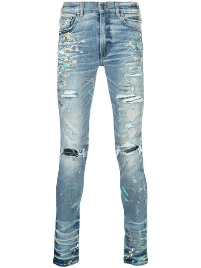Shop Amiri Paint-splatter Skinny Jeans In Blue