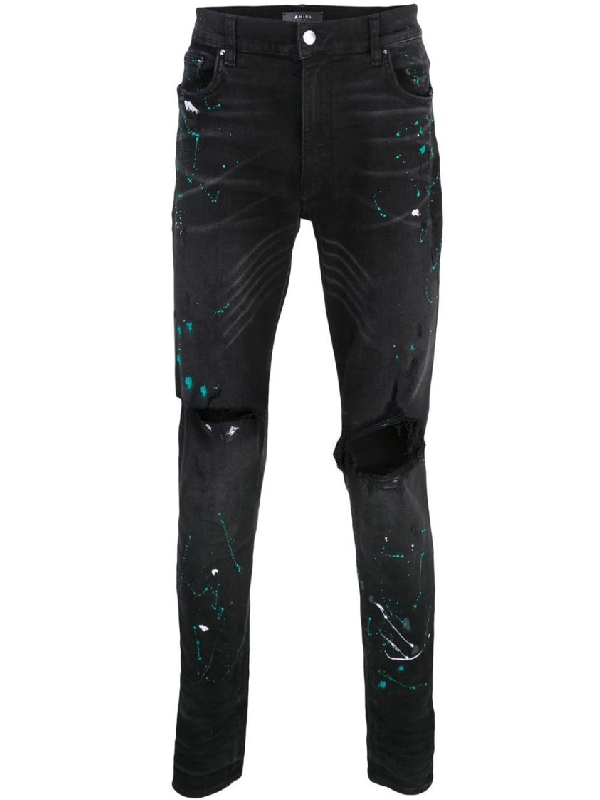 black ripped jeans men's paint splatter