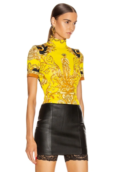 Shop Versace Baroque Turtleneck Crop Top In Caramel & Yellow