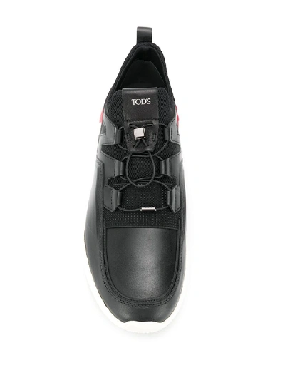 Shop Tod's Low-top Sneakers In Black