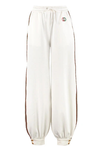 Shop Gucci Track-pants With Decorative Stripes In White