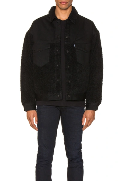 Shop Levi's Oversized Sherpa Trucker Jacket In Ivan Black