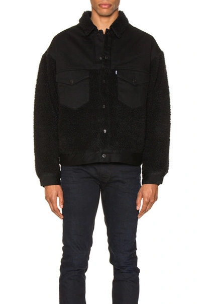 Shop Levi's Oversized Sherpa Trucker Jacket In Ivan Black