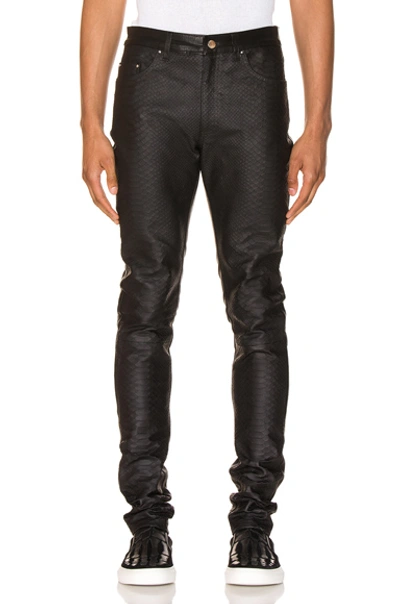 Shop Amiri Half Printed Python Leather 长裤 In Black
