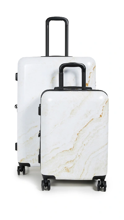 Shop Calpak Gold Marble Two Piece Suitcase Set