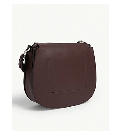Shop Allsaints Darcy Leather Cross-body Bag In Bordeaux Red