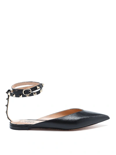 Shop Valentino Studded Pointy Toe Flats In Black