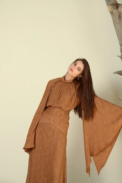 Shop Amal Al Mulla Orange Silk Printed Top With Exaggerated Bell Sleeves In Brown