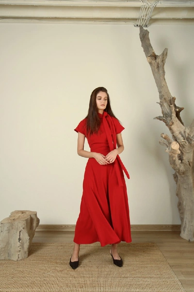 Shop Amal Al Mulla Ruby Red Crepe Midi With A Long Side Slit And A Soft Turtle Neck Collar That Ties Into A Bow.