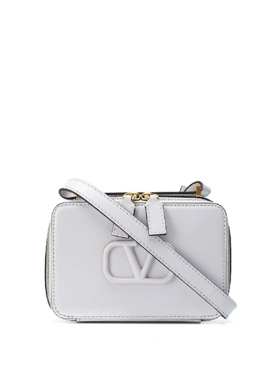 Shop Valentino Vsling Small Leather Crossbody Bag In White